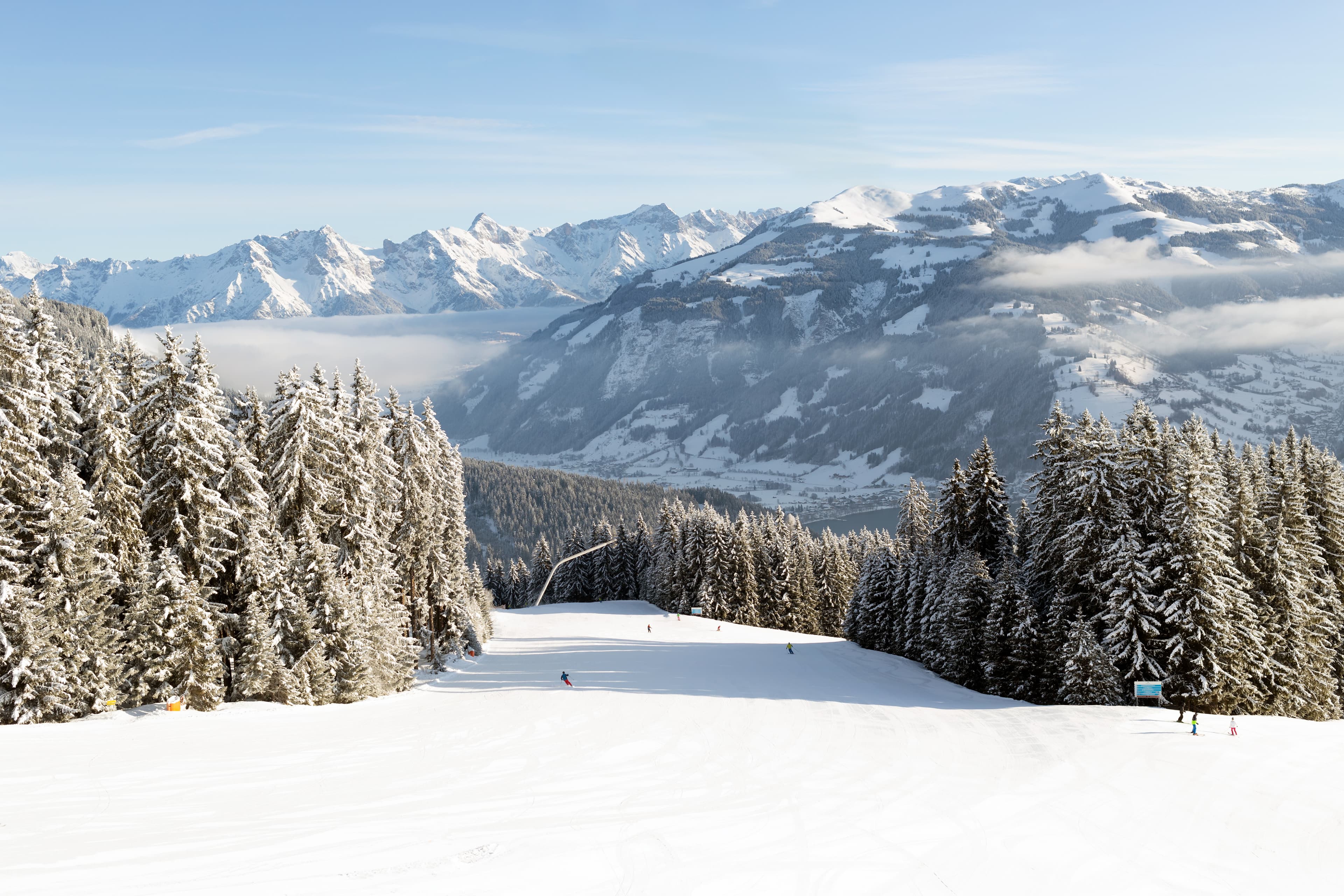 Ski slope with mountain peaks — ski resort comparison